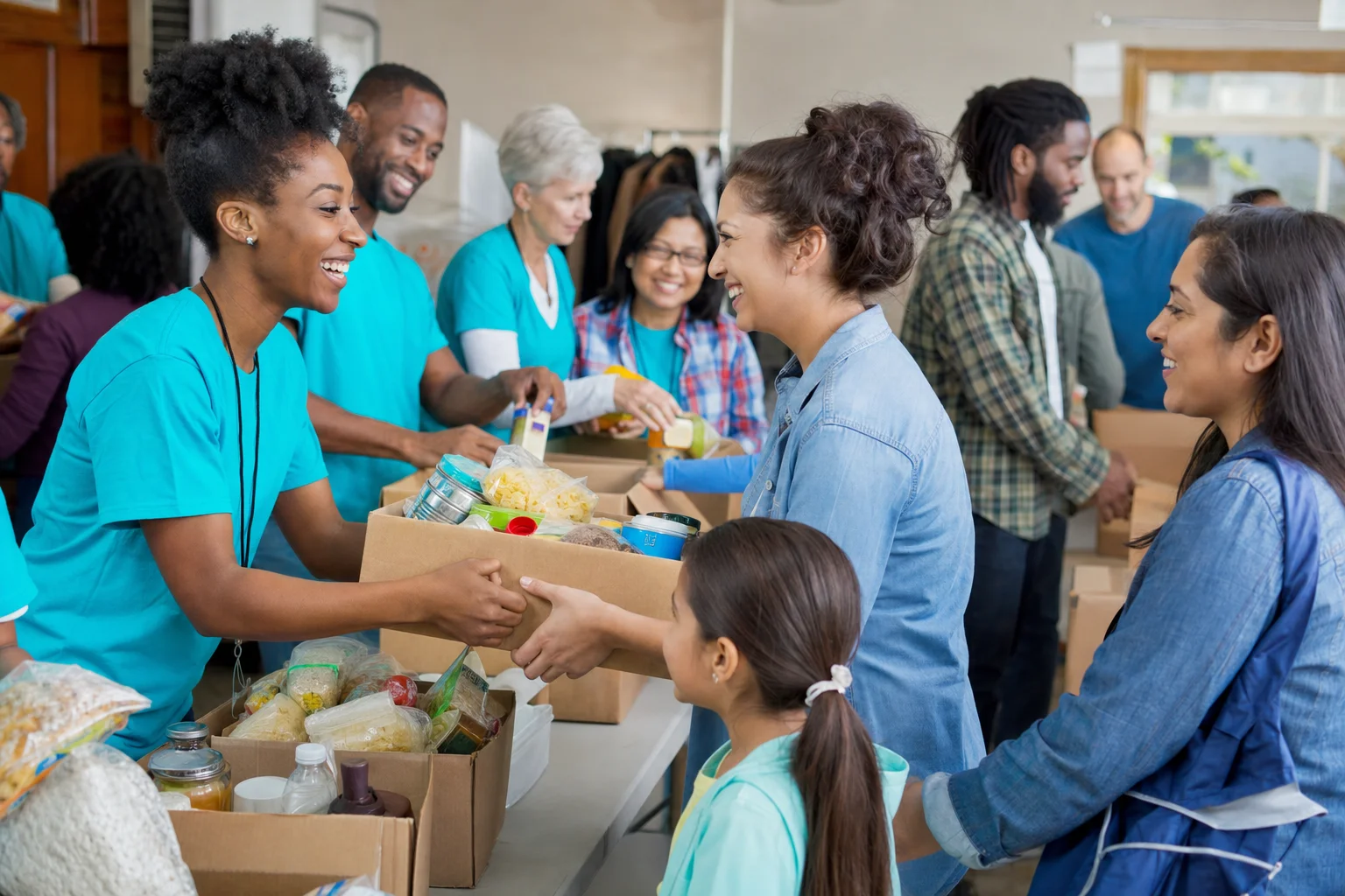 Community volunteers sorting donations at a Helpmates Foundation drive